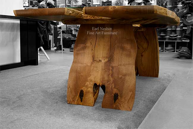 custom made mesquite dining table showing figure in front slab legs and base from a different angle
